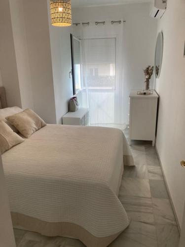 Katil atau katil-katil dalam bilik di Holidays beach Estepona