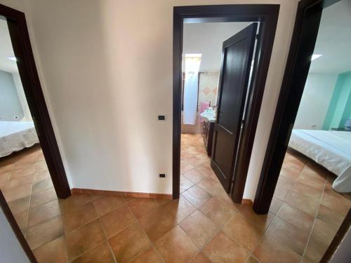 Postel nebo postele na pokoji v ubytování La Villa di Gina