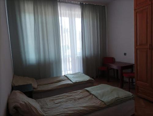 Postel nebo postele na pokoji v ubytování Jak w PRL