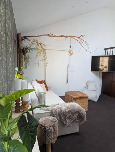 Postel nebo postele na pokoji v ubytování Baumhaus Suite