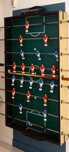 a green locker with a bunch of people on it at Appartement Petits Champs in Paris