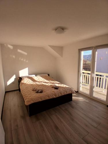 Postel nebo postele na pokoji v ubytování Apartman Eni