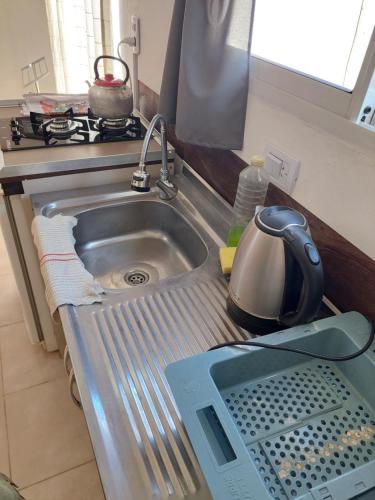 Η κουζίνα ή μικρή κουζίνα στο Departamento Monoambiente 4 Del Sauce