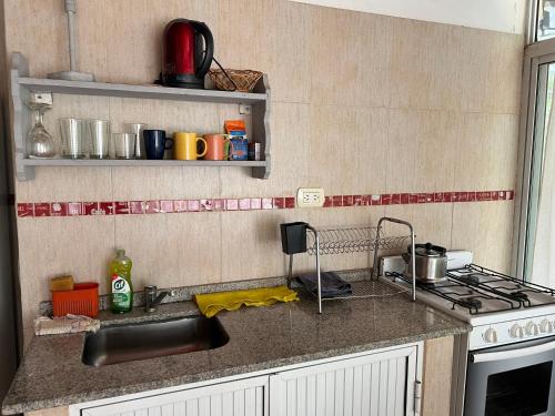 Dapur atau dapur kecil di Cabañas Don David