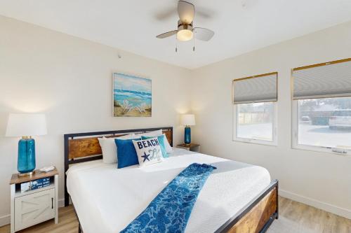 En eller flere senge i et værelse på The Beach Suite #3