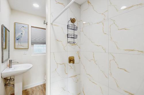 Et badeværelse på The Beach Suite #3