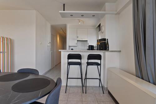 Cuisine ou kitchenette dans l'établissement Cosy Calmeyn