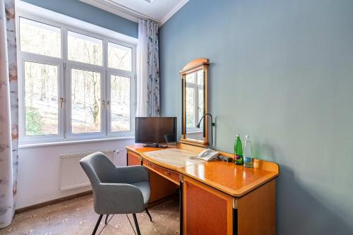 TV a/nebo společenská místnost v ubytování Spa & Wellness Hotel Silva