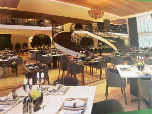 Εστιατόριο ή άλλο μέρος για φαγητό στο Gran Paradiso Resort Hotel