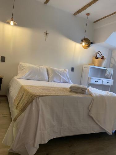 Ένα ή περισσότερα κρεβάτια σε δωμάτιο στο Casa Mariajosé
