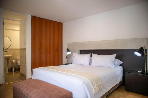 Ένα ή περισσότερα κρεβάτια σε δωμάτιο στο Stunning 3BR in Miraflores