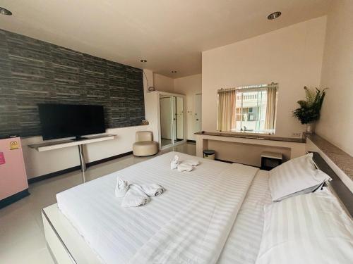 Postel nebo postele na pokoji v ubytování Ree- Riverside hotel