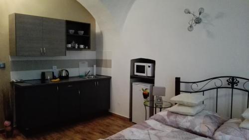 Ένα ή περισσότερα κρεβάτια σε δωμάτιο στο Apartment Jakubská 676