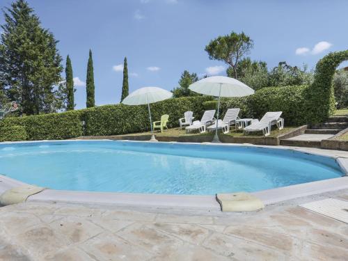 Πισίνα στο ή κοντά στο Holiday Home L'Uccelliera-1 by Interhome