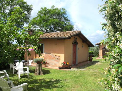 Zahrada ubytování Holiday Home L'Uccelliera-1 by Interhome