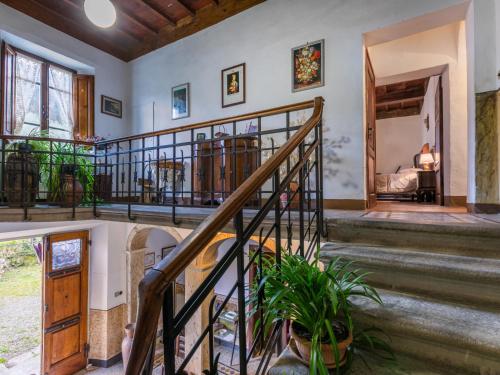 an indoor staircase in a home with a stair case at Holiday Home La Terrazza by Interhome in Radda in Chianti
