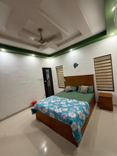Cama o camas de una habitación en COSTAL Elegance 25 Varkala