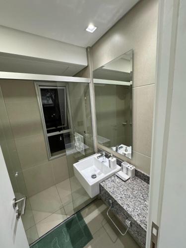a bathroom with a sink and a mirror at Depto de 2habitaciones, zona centrica in Asuncion