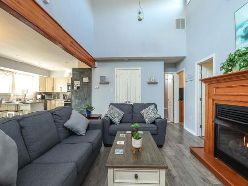 a living room with a couch and a fireplace at Beach Haven West Has It All, Pool, Hot Tub in Beach Haven West