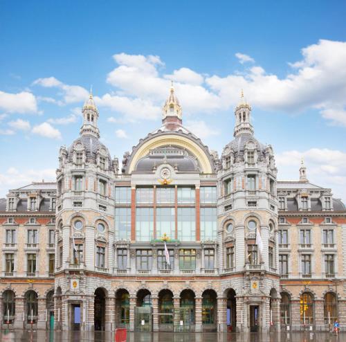 a large building with a lot of windows at Radisson Blu Hotel, Antwerp City Centre in Antwerp