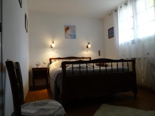 Posteľ alebo postele v izbe v ubytovaní Chambres d'Hôtes Le Baou