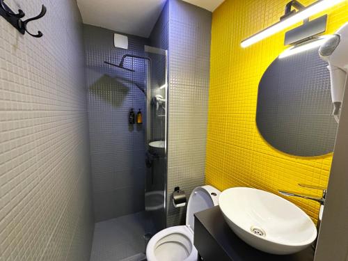 Koupelna v ubytování Diuma Hotel