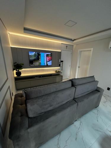 Μια τηλεόραση ή/και κέντρο ψυχαγωγίας στο Apartamento Alegria, 104 PIRATUBA SC