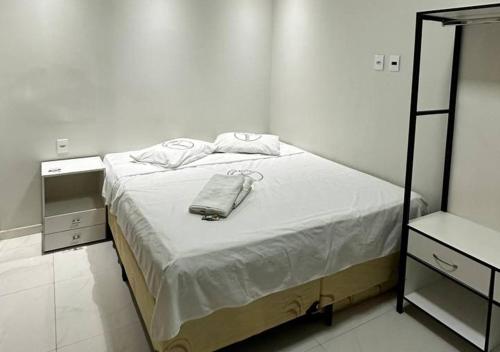 Ένα ή περισσότερα κρεβάτια σε δωμάτιο στο Hotel Castanhal