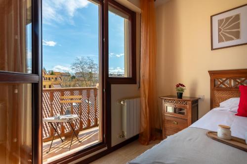 Ένα ή περισσότερα κρεβάτια σε δωμάτιο στο Duplex en Comillas con garaje