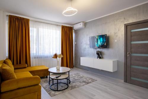 Una televisión o centro de entretenimiento en Joy Residence