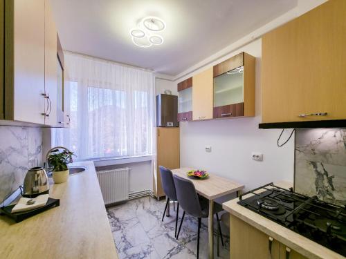 Kuchyň nebo kuchyňský kout v ubytování Joy Residence