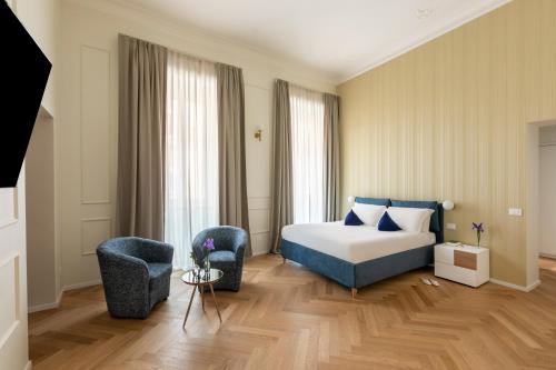Ένα ή περισσότερα κρεβάτια σε δωμάτιο στο SJR Luxury Apartment Trevi Fountain