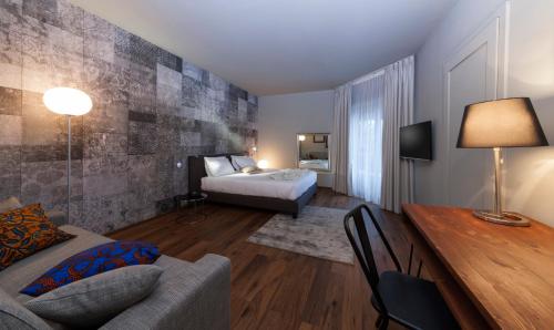 Postel nebo postele na pokoji v ubytování Living Hotel Milano