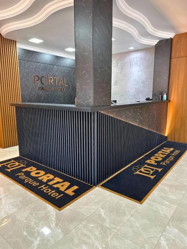 Lobi atau kawasan kaunter penerimaan di PORTAL PARQUE HOTEL