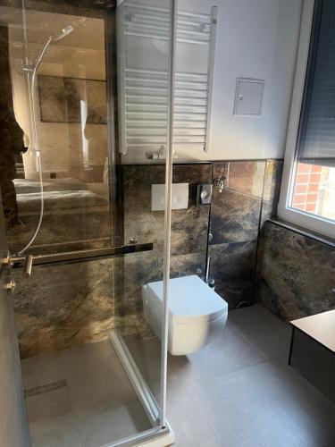 Koupelna v ubytování Hotel Heidelux