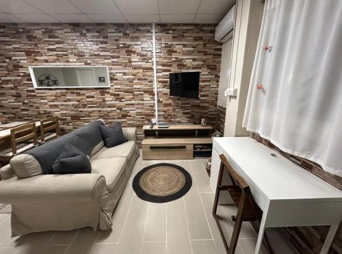 TV a/nebo společenská místnost v ubytování Mi refugio en la playa