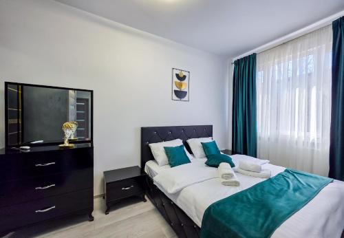 Una cama o camas en una habitación de Joy Residence
