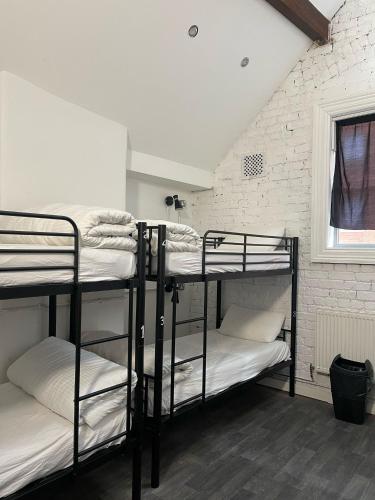 Postel nebo postele na pokoji v ubytování Rahman Hostel