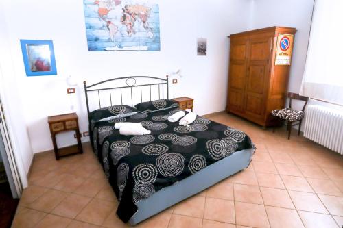 Ένα ή περισσότερα κρεβάτια σε δωμάτιο στο iLBarco