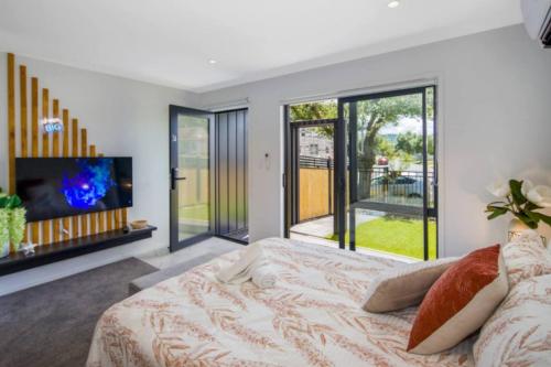 Ένα ή περισσότερα κρεβάτια σε δωμάτιο στο Lower Hutt Hideaway