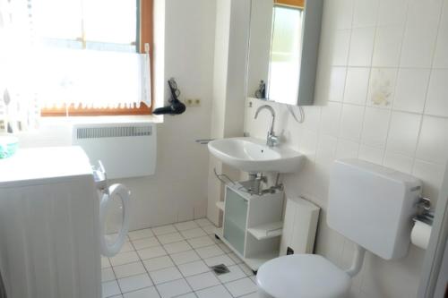 Koupelna v ubytování Einladende Ferienwohnung auf Fehmarn