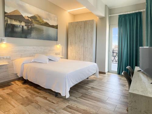 Postel nebo postele na pokoji v ubytování Te Maná Hotel