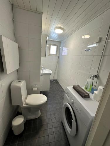 Ванная комната в Modern two-room flat with balcony near metro