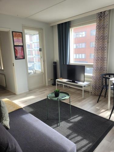 Гостиная зона в Modern two-room flat with balcony near metro