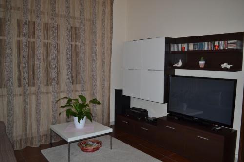 TV a/nebo společenská místnost v ubytování The Bamboo House