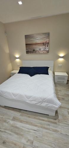 Katil atau katil-katil dalam bilik di Reef Apartment