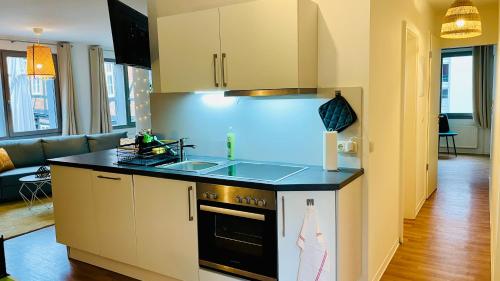Η κουζίνα ή μικρή κουζίνα στο FeWoZauber - Dom Suite, Zentral, 7 Pers, 4 Zimmer, Design, Family, Haustier