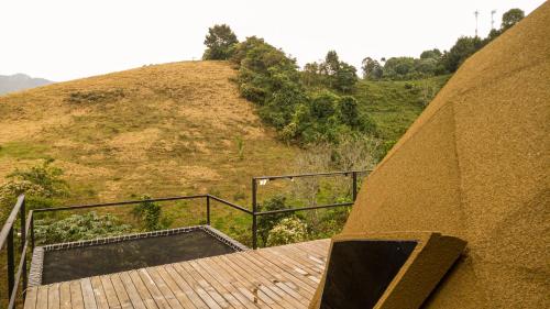 a view from the top of a building with a hill at Green Valley Glamping Salento in Salento