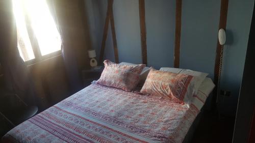 Кровать или кровати в номере Hotel Reina Victoria Valparaíso