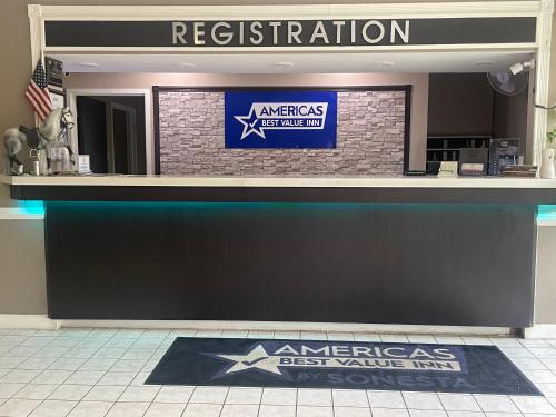 a restaurant with an americas best value inn sign at Americas Best Value Inn - Wilson in Wilson